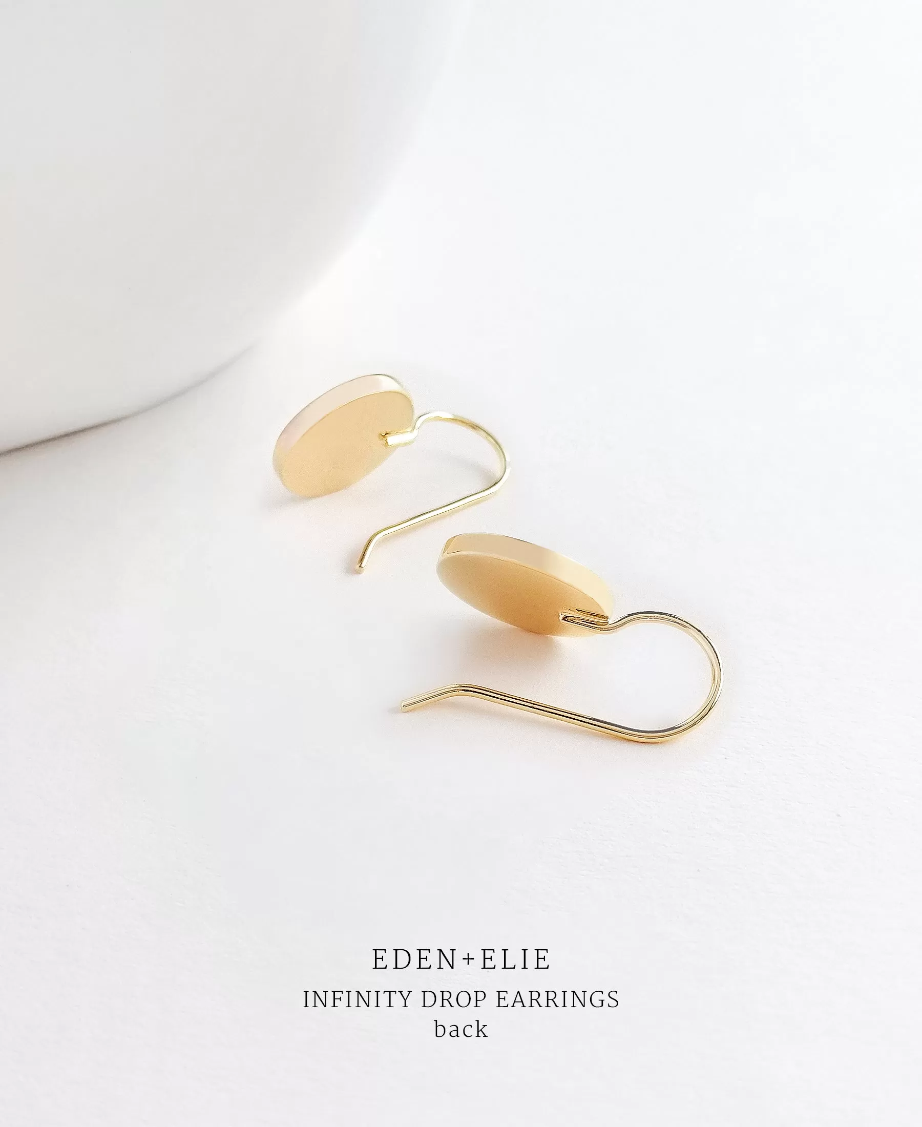 EDEN   ELIE Infinity drop earrings - petal